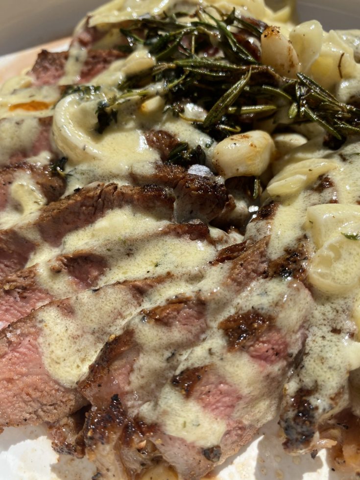 strip steak with garlic herb cheese sauce